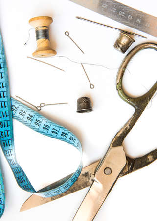 Overhead view of old sewing tools and accessoriesの写真素材