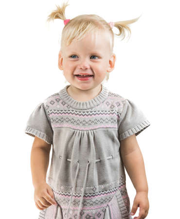 Happy child baby girl toddler looking straight isolatedの写真素材