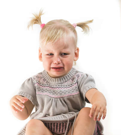 crying baby girl isolatedの写真素材