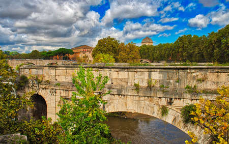 Rome cityscape - An old bridge in Romeの写真素材