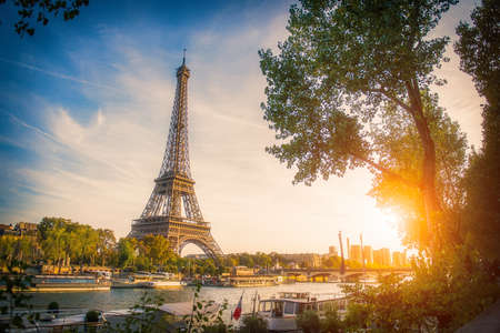 Sunset view of Eiffel tower and Seine river in Paris, France. Architecture and landmarks of Paris. Postcard of Parisの写真素材