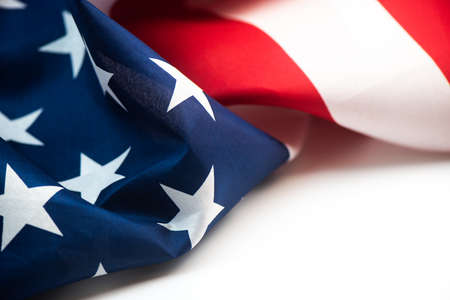 Closeup of American flag on plain backgroundの写真素材