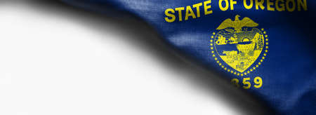Fabric texture of the Oregon flag on white background.の写真素材