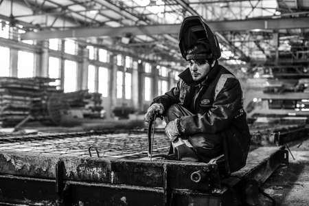 Kyiv, Ukraine - January 27, 2016: Old factory for concrete production. The staff and workers of the old workshop of concrete production. Technological processes of concrete productionのeditorial素材