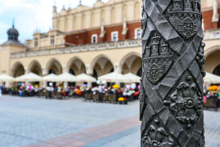 Krakow, Poland- May 25, 2016: Church of Our Lady Assumed into Heaven. Is a Brick Gothic church re-built in the 14th century. With tourists on squareのeditorial素材