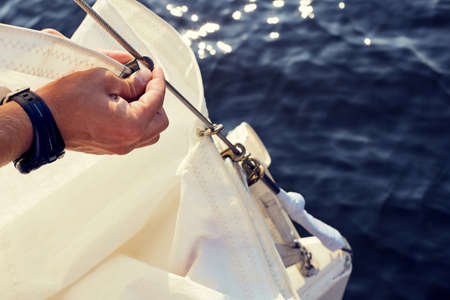 Preparing before lifting staysail sails. Before going out into the seaの写真素材