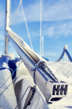 Rope chekel on the boom fix a mainsail and attached Main-sheet