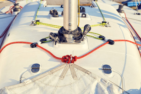 Preparation of staysail for use. Tie the sheets to genoa on the boatの写真素材