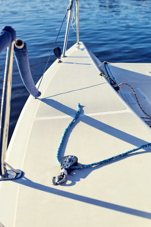 Equip yacht with, weather and lee braces for spinnaker