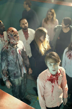 Kyiv, Ukraine - January 2, 2017: Preparation zombie models to the halloween party in forgotten cold basementのeditorial素材