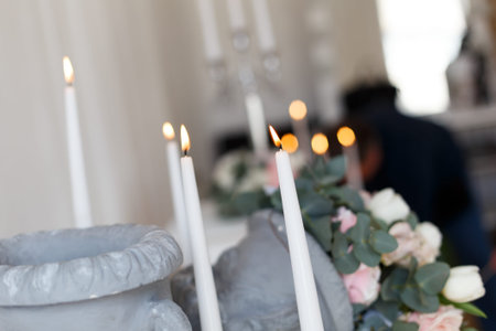 Candles near the wedding table close up