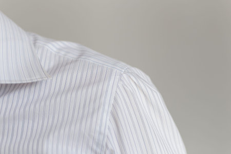 Leche and collar of a representative white shirt. Marvelous work of tailor