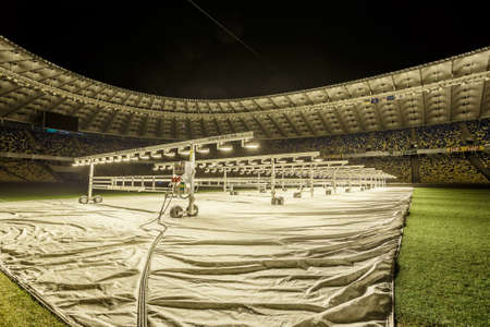 Kyiv, Ukraine - 02 March, 2017: NSC Olimpiiskiy. Central soccer stadium in Ukraine. Open training of runnersのeditorial素材