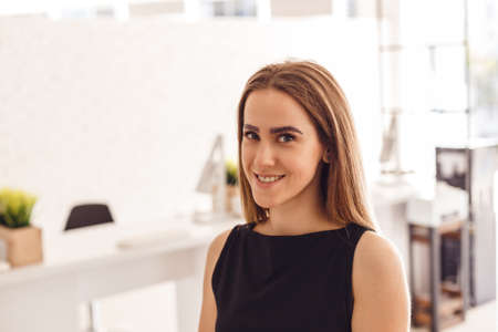 Attractive young woman customer with henna-colored eyebrows. Professional care for face.の写真素材