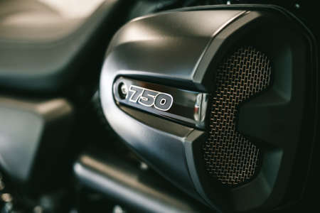 Closeup view of part of sporty black motorcycle - the air filter box.の写真素材