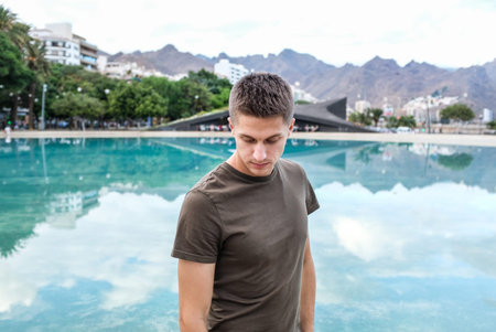 Man portrait near the lake on moutail island with perfect landscape