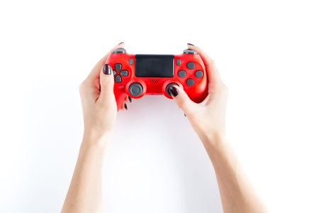 Game controller of gaming consoles in woman hands