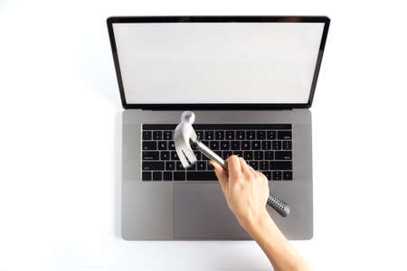 Lap top topview with hands on white background. Mockup developing tool.の写真素材