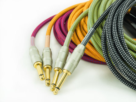 Guitar cable on white background