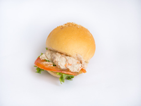 Tuna-salad hamburger on white backgroundの写真素材