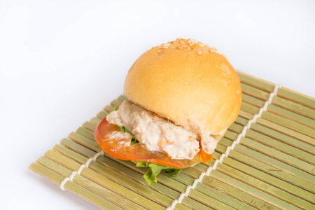 Tuna-salad hamburger on white backgroundの写真素材