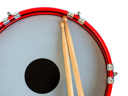 Snare drum with coated head and drumstick isolated on white background. の写真素材