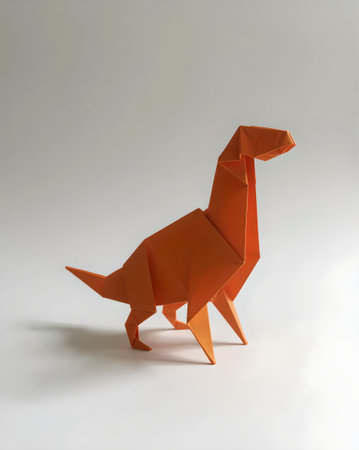 Minimal origami dinosaur sculpture in soft light, symbol of creativity and artistic simplicity.の素材