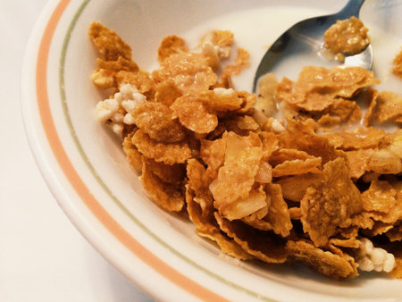 A bowl of cornflakes in milk