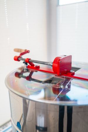 Top Handle of a Manual Centrifugal Extractor for Bee Honey to Harvest Beehives for Beekeepingの写真素材