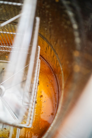Extracted Honey on the Bottom of the Barrel of a Centrifugal Extractor for Beekeeping Harvestの写真素材