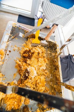 Decapping Tray withCapping Scratchers and Collected Beewax After Bee Honey Harvestの写真素材