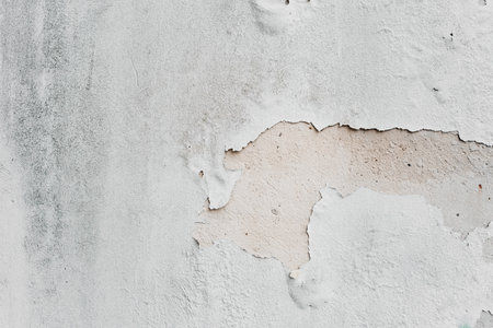 White Peeling Paint on Plaster Wall Textureの写真素材