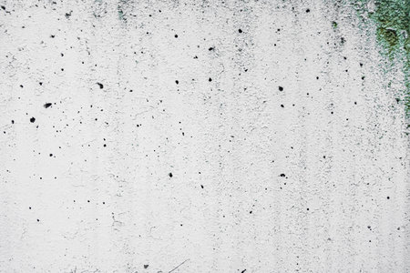 Weathered White Concrete Wall Texture with Holes and Cracks