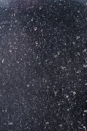 Dark Surface with Raw White Scratches Textureの写真素材