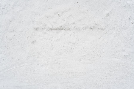 Rough Plaster Stone Texture Covered with White Paintの写真素材