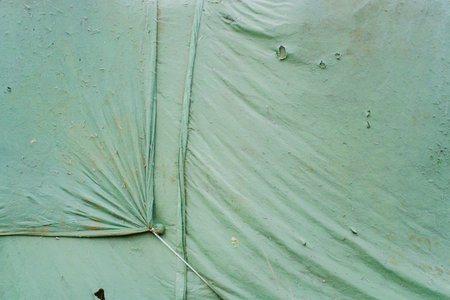 Dirty Green Cloth Texture with Wrinklesの写真素材