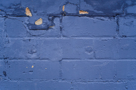 Weathered Broken Brick Stone Wall Textureの写真素材