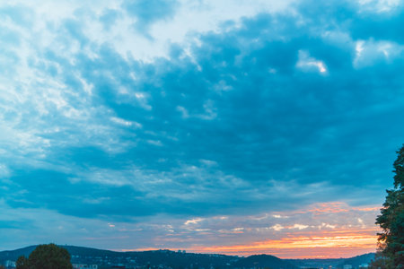 Cloudy Sunrise Over the Horizon Landscapeの写真素材