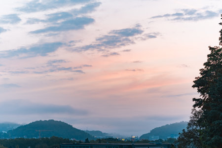Pastel Colored Sky With Clouds Early in the Morningの写真素材