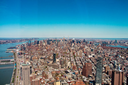 Aerial View Above New York City along Manhattan with the Empire State Building in the Centerの写真素材