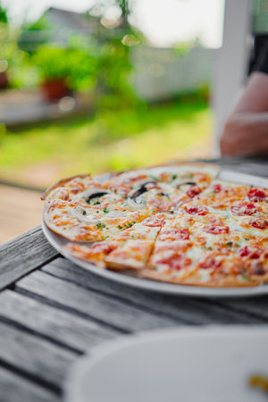 Flammekueche with CrÃ©me Fraiche and Tomatoesの写真素材