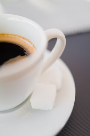 Cup of Coffee with Sugar as Closeup Shotの写真素材