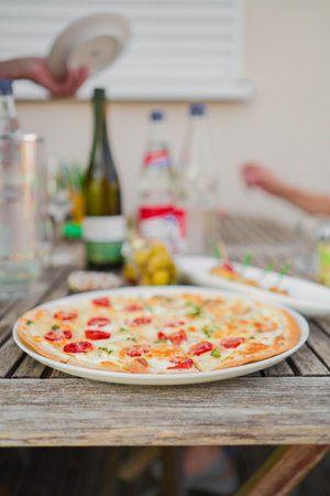 Tasty Fresh French Tarte FlambÃ©e with CrÃ©me Fraiche and Tomatoesの写真素材