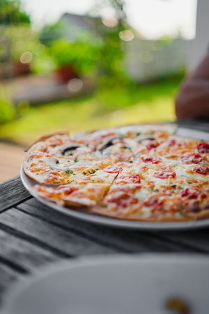 Fresh Tarte Flambee with CrÃ©me Fraiche and Tomatoesの写真素材