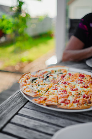 Fresh French Flammekueche with Tomatoes and Mushroomsの写真素材