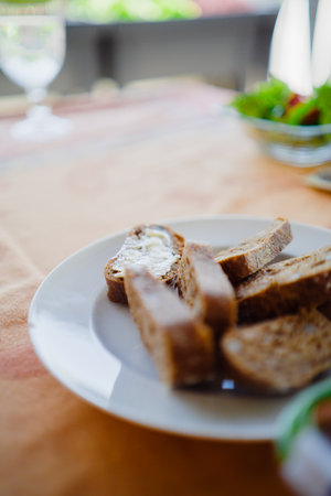 Butter Bread Sandwitch on a White Plate as Apatizerの写真素材