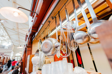 Kitchen Tools Hanging in a Restaurant Kitchenの写真素材