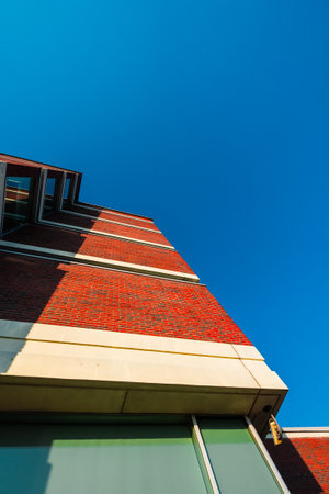 Exterior Red Brick Stone House Facade Viewed from Bottom Upの写真素材