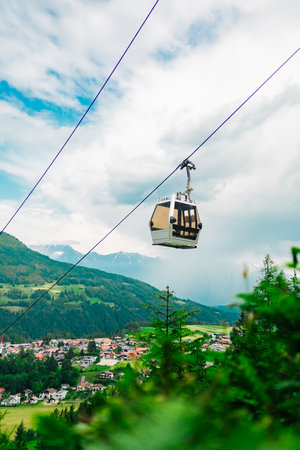 Cable Car Cabin Ascending Up the Mountainの写真素材