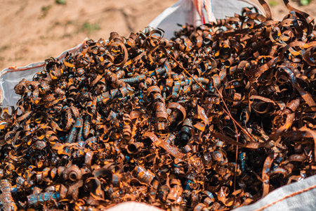 Decayed and Rusty Metal Waste Chips Material from a Construction Site